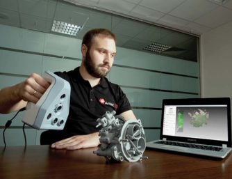 man scanning object using Artec Spider 3D scanner