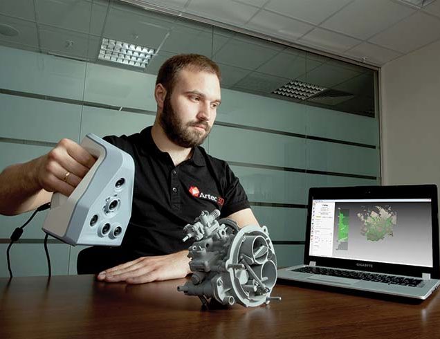 man scanning object using Artec Spider 3D scanner